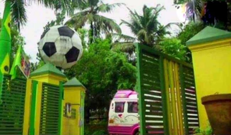 Football-loving couple in Kochi has painted their house in colour of Brazil's flag and named it 'House of Brazil' to show their support to the country in the ongoing FIFA World Cup. (Photo: ANI)