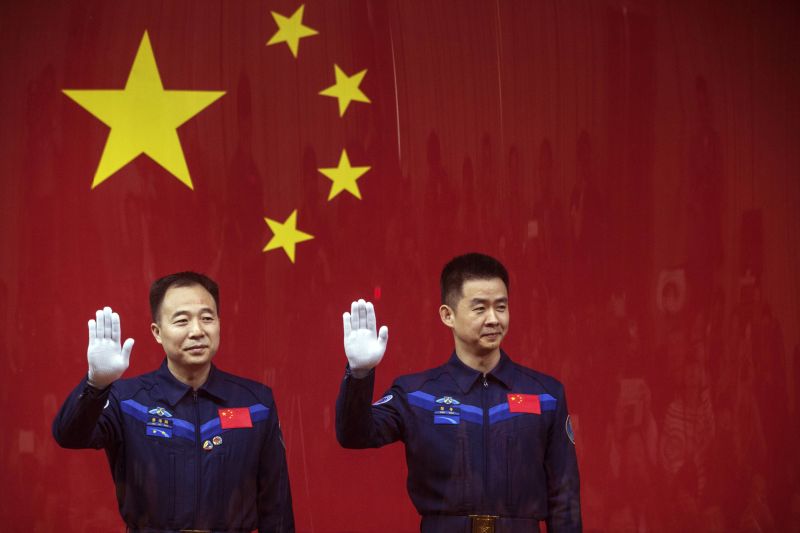 China blasts off two astronauts on longest manned mission