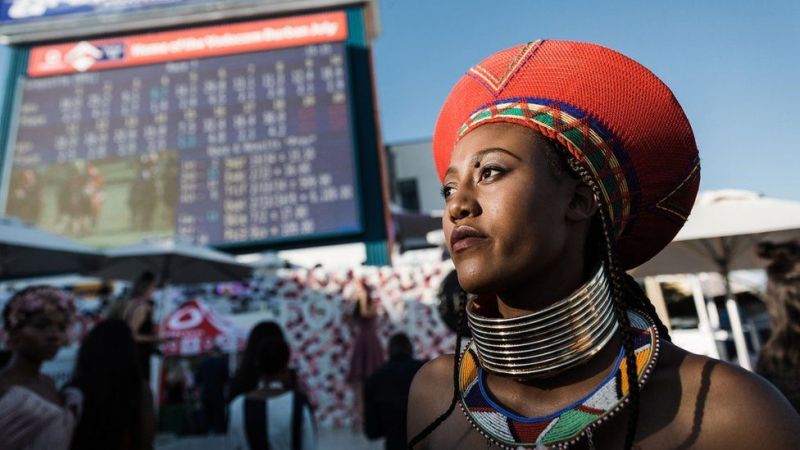 Revellers incorporate high fashion and tradition in dazzling outfits at Durban race