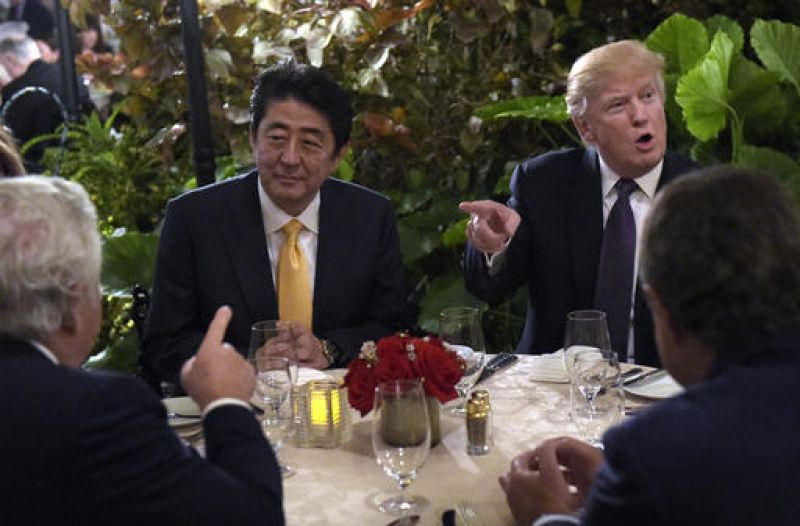 Donald Trump and Japans Shinzo Abe share high-five on Florida golf course