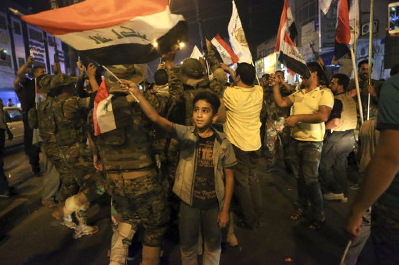 In pics: Iraqis celebrate Mosul victory; PM al-Abadi congratulates army