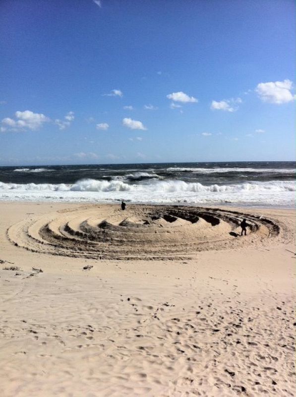 Sand artist creates breathtaking designs that can only be understood aerially