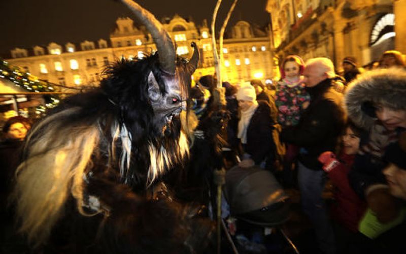Angels and demons in Prague streets for St. Nicholas Day