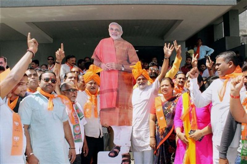 Modis magic brings a saffron Holi to Uttar Pradesh