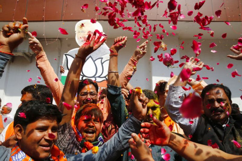 Modis magic brings a saffron Holi to Uttar Pradesh