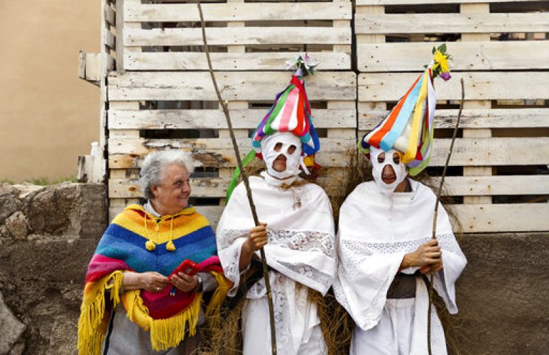 Spain celebrates colourful mask parade ahead of carnival celebrations