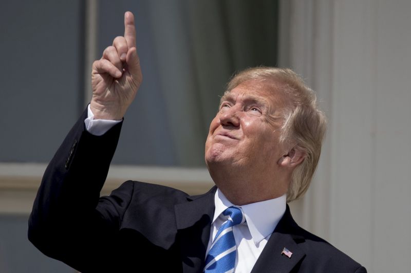 US President Donald Trump takes time off to awe at the Solar Eclipse