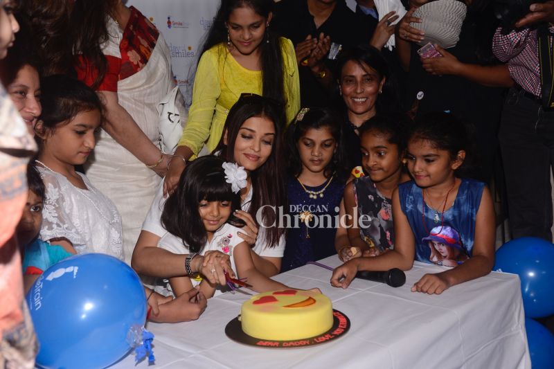 Day of Smiles: Aishwarya celebrates fathers birth anniversary with kids