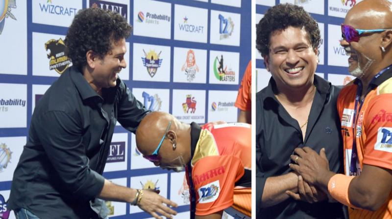 Kambli reached out to batting legend Tendulkar and touched his feet as a sign of respect. (Photo: Twitter)