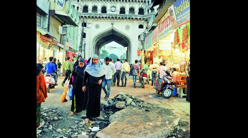 Entire stretch starting from Laad Bazaar to Charminar has been dug up by GHMC officials. (Photo: DC)