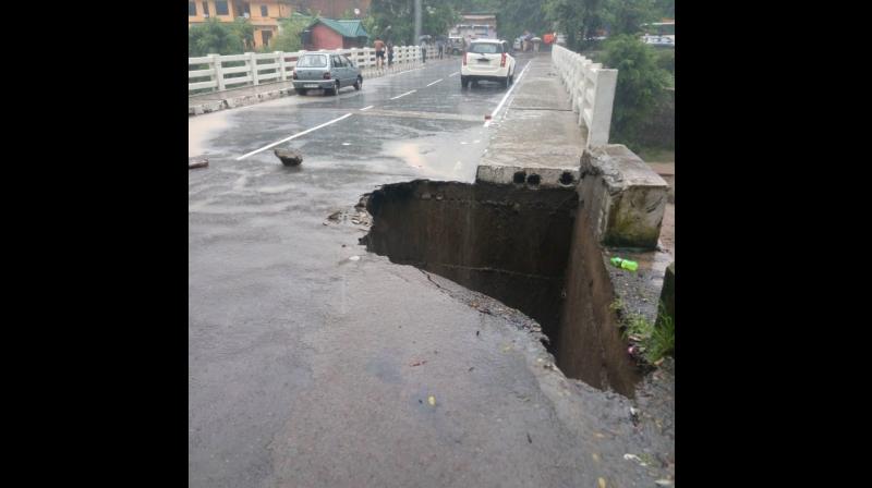 Traffic movement from Kandaghat to Chail halted after a part of a bridge collapsed following heavy rainfall. (Photo: Twitter | ANI)