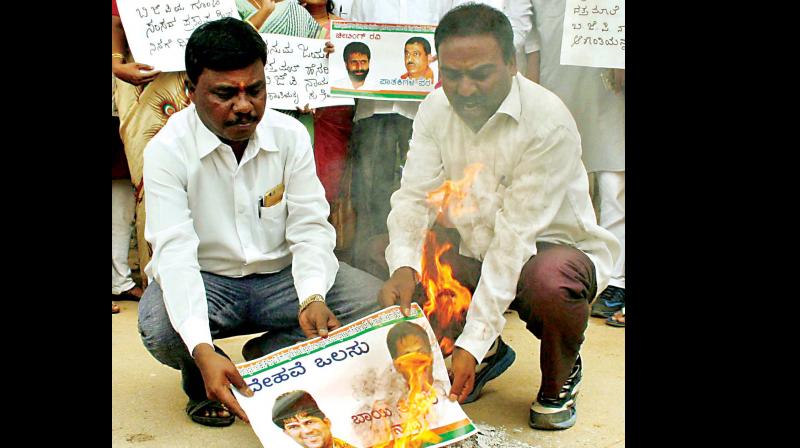 Youth Congress members protest in Bengaluru on Monday seeking action against MP Pratap Simha for the incidents at Hunsur on Sunday 	 KPN
