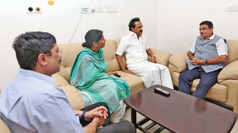 Union Minister for Road and Transport Nitin Gadkari interacts with DMK working president M.K. Stalin and MP Kanimozhi in Chennai on Monday. Dayanidhi Maran is also seen. (Photo:DC)