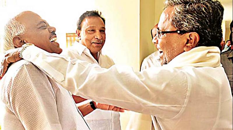 Speaker Ramesh Kumar and former CM Siddaramaiah in a file photo.