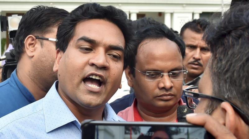 Sacked Delhi minister Kapil Mishra speaks to representatives from media after attending the special session of Delhi Assembly in New Delhi. (Photo: PTI)