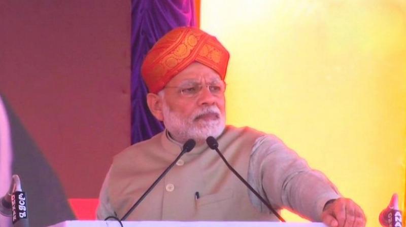 Addressing a BJP public rally at Mysuru in Karnataka, Prime Minister Narendra Modi said after he levelled a 10 per cent commission charge against the Siddaramaiah govt, he received many calls saying his information was incorrect and it was much more. (Photo: ANI | Twitter)