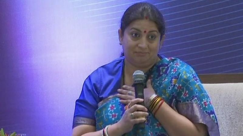 Addressing an event, Union Textiles Minister Smriti Irani also shared an anecdote when she had to wait outside a temple, with her son inside. (Photo: Twitter | ANI)