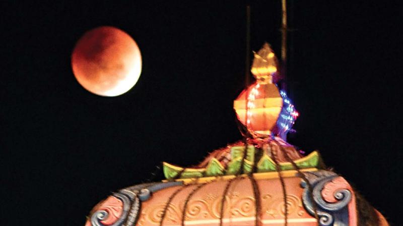 Lunar eclipse, the much awaited blood moon appeared slightly later than expected as people gathered to have a glimpse of rare cosmic wonder in Madurai on Wednesday.