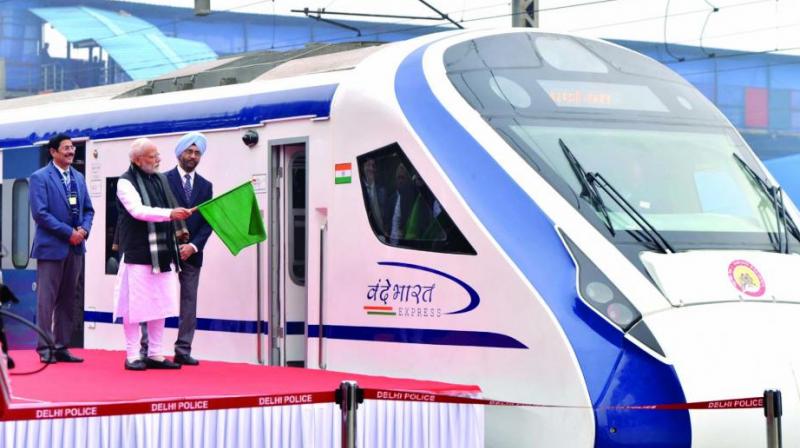 Prime Minister Narendra Modi flags off Vande Bharat Express, Indias first semi-high speed train at New Delhi railway station on Friday. The train has been able to attain a maximum speed of 130 kmph during its inaugural run between Delhi and Varanasi, officials said. (Photo: DC)