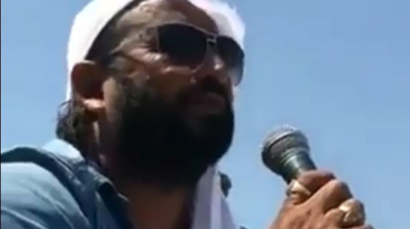 The 26-second video clip purportedly shot during the Dogri Swabhiman rally shows Choudhary Rajinder Singh atop a vehicle and using abusive language against Mehbooba Mufti. (Photo: Screengrab)