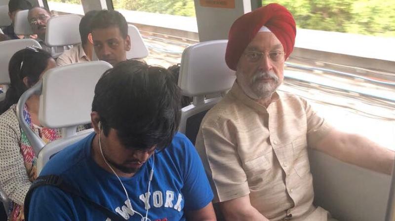 Minister of state for Union Affairs Hardeep Singh Puri tweeted his picture on the train with other passengers. (Photo: Twitter/@HardeepSPuri)