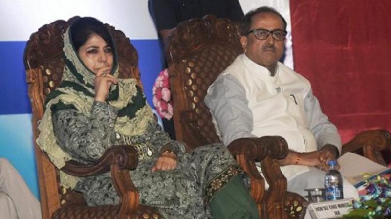 Jammu and Kashmir Chief Minister Mehbooba Mufti and Deputy CM Nirmal Singh. (Photo: PTI)