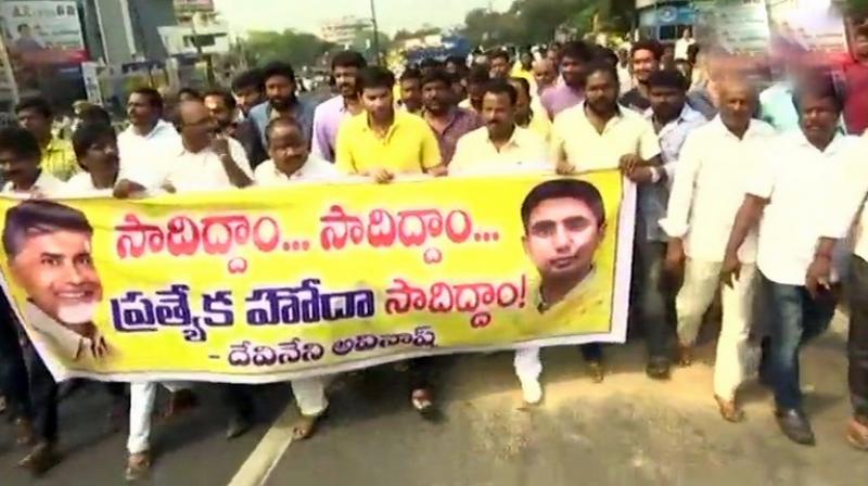 Telugu Desam Party (TDP) held protest in Vijayawada demanding special status for the state. (Photo: ANI | Twitter)