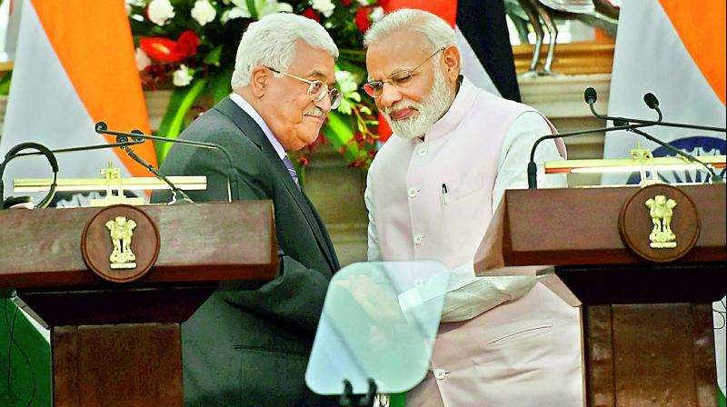 Prime Minister Narendra Modi with Palestinian President Mahmoud Abbas after their joint press statement in New Delhi on Tuesday. (Photo: PTI)