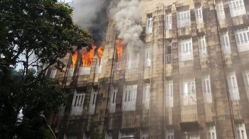 The blaze started on the third floor of the I-T office located in multi-storeyed Scindia House. (Photo: Twitter/ANI)