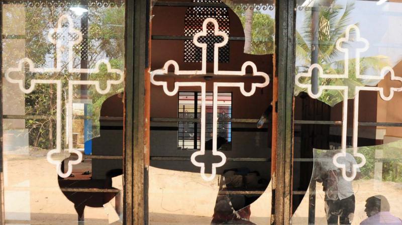 The window panes of the St Marys Church are broken after the clash in Thrissur.