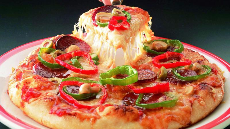 A standard pizza should not contain more than 928 calories now, says plan.