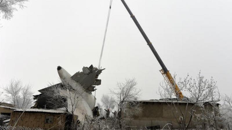 The bodies of 37 victims of the crash in the village of Dacha Suu had been identified at a local morgue, including those of three of the aircrafts four pilots. (Photo: AP)
