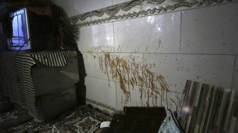 Blood stains are seen on the wall at a parliament members house after a late night attack in western Kabul, Afghanistan. (Photo: AP)