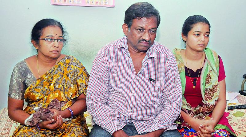 Family members of Sharath Koppu, a non-resident Indian who was killed in the July 6 shootout at a restaurant in Kansas City.