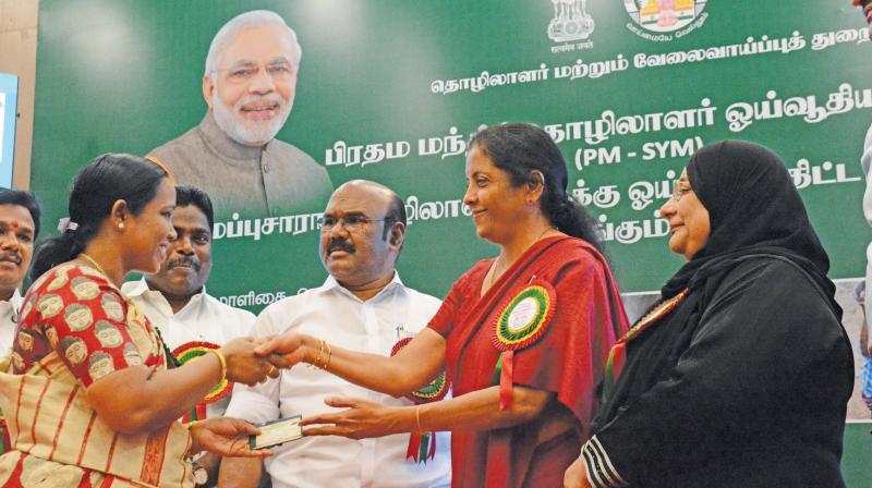 Defence minister Nirmala Sitharaman launches the PM - SYM (Pradhan Mantri Shram Yogi Maan Dhan Yojana - a pension scheme for unorganised workers in TN. Fisheries minister D. Jayakumar and labour welfare minister Nilofer Kafeel also present. (Image DC)