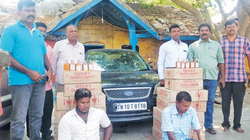 The police had received a tip-off that liquor bottles were smuggled into Pondicherry from a different state and were prepared to intercept them.
