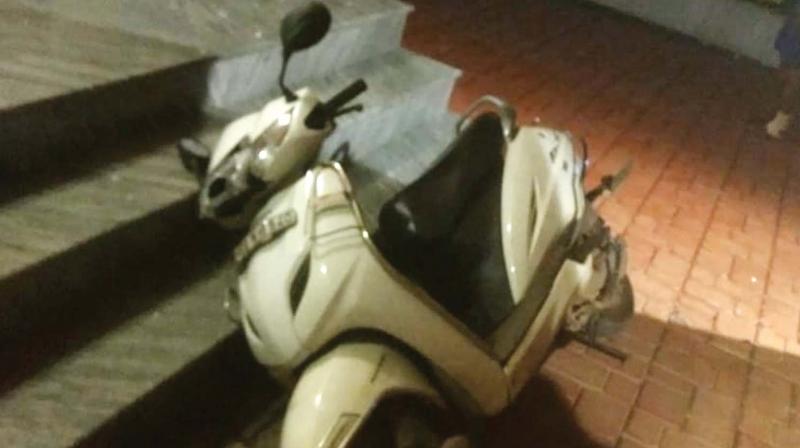 The two-wheeler parked at the house of CPM leader Suresh Changadam destroyed at Payyoli on Wednesday.