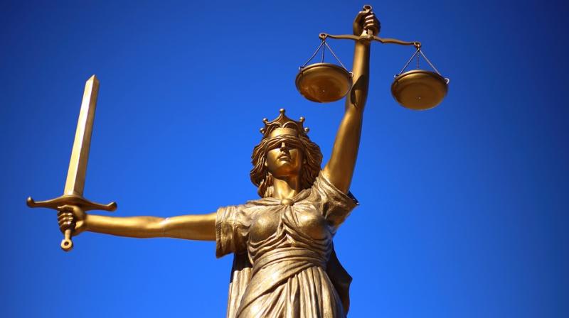 The time-honoured symbol of justice has been epitomised in the inspiring depiction of a crusading blindfolded woman with a scale in one hand and a sword in the other. (Photo: Pixabay)