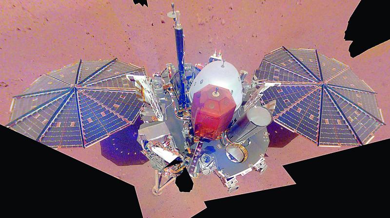 Composite image made available by NASA on Wednesday shows the InSight lander on the surface of Mars. (Photo: AP)