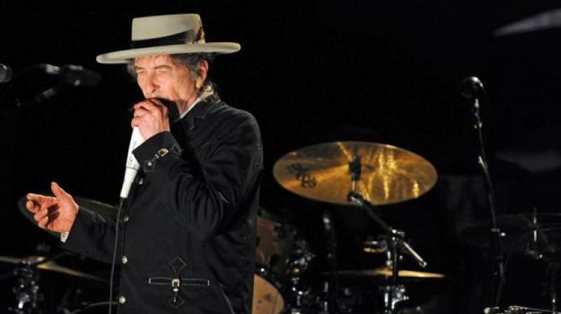 Dylan needs to give a lecture within six months from Dec. 10. It does not necessarily need not be delivered in Stockholm (Photo: AFP)
