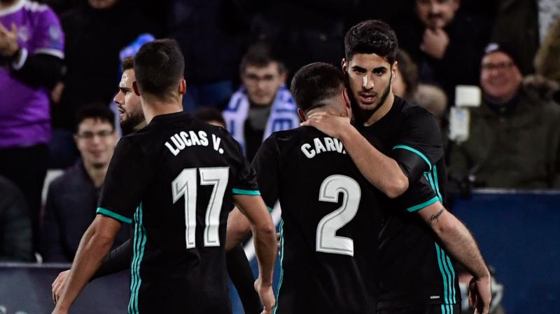 Marco Asensios (right) late intervention gave Real a much needed boost following last weekends 1-0 defeat at home to Villarreal that left them 18 points behind arch rivals Barcelona in La Liga. (Photo: AFP)