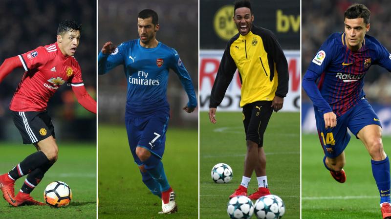 While Alexis Sanchez and Henrikh Mkhitariyan swapped clubs, Philippe Countinho and  Pierre-Emerick Aubameyang made big money move to BVarcelona and Arsenal respectively. (Photo: AP / AFP)