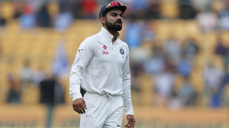 Virat Kohli still expects his spearhead slow bowlers Ravichandran Ashwin and Ravindra Jadeja to continue what they have been doing over a successful home season. (Photo: PTI)