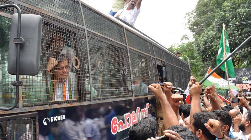 Shashi Tharoor, MP, acknowledges supporters after being arrested in connection with the UDF secretariat picketing on Tuesday (Photo: DC)