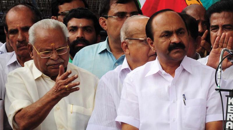 KPCC vice-president V.D. Satheesan with former minster C.N. Balakrishnan during the picketing of Thrissur Collectorate held as part of the state-wide protest called by the UDFon Tuesday. (Photo: DC)