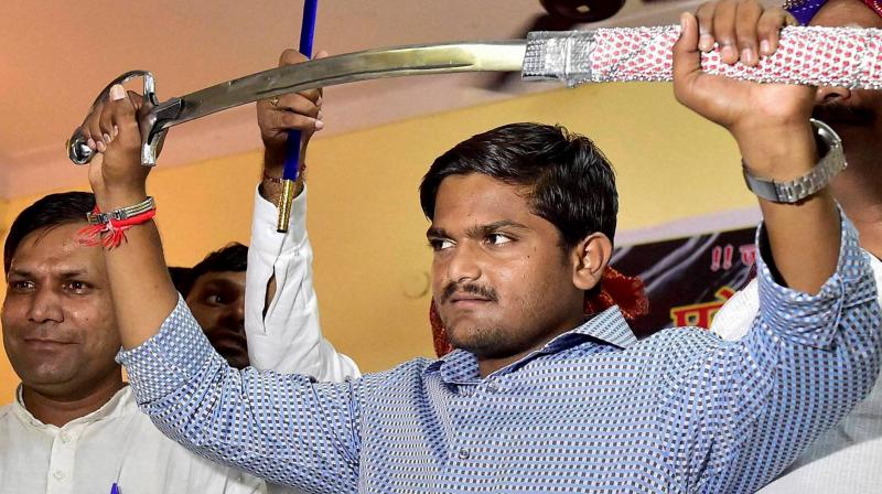 Hardik Patel had earlier set a condition that he would support the Congress in the Assembly polls, due next month, only if the party committed to reservation in education and government jobs for his community. (Photo: PTI/File)