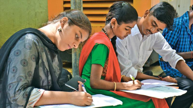 Students fill applications for law courses on Tamil Nadu Dr Ambedkar Law University campus on Friday. (Photo: DC)