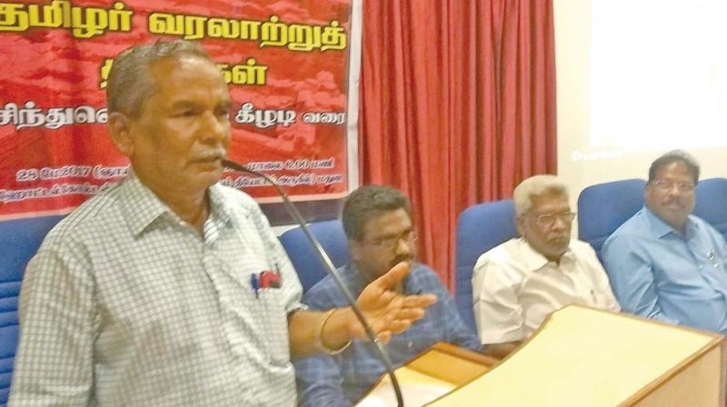 Renowned archeologist C Santhalingam addresses a seminar on Archeology Footprints of Tamil History organised by Karuthu Pattarai in Madurai. (Photo: DC)