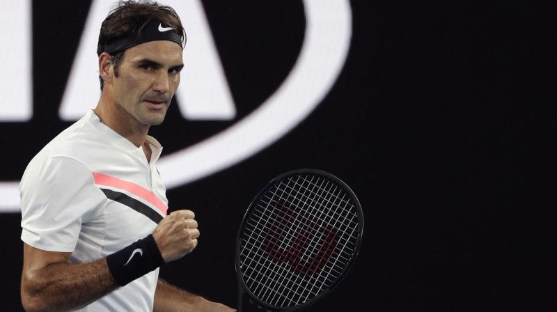 Federer looked just as imperious as when he won the last five games to beat Rafa Nadal in last years thrilling final and end a five-year wait for his 18th major. (Photo: AP)