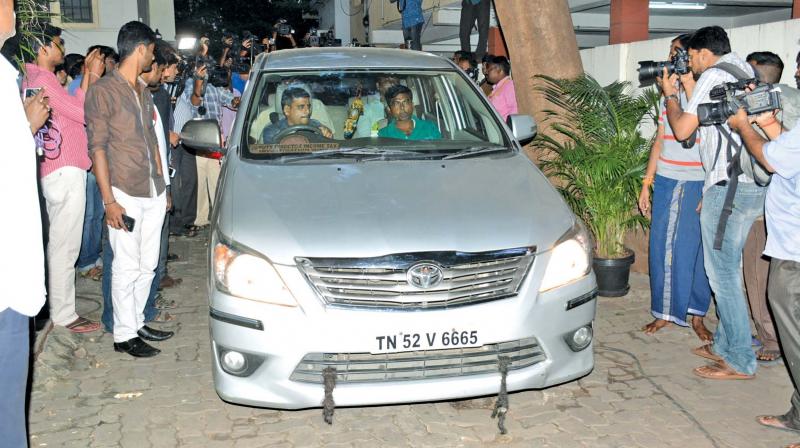 I-T officials coming out of the T Nagar property after the raids on Thursday. (Photo: DC)